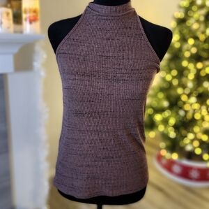 Perfect top for layering or under a blazer. Dress it up or down!